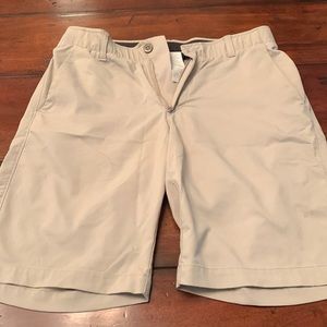 Under Armour khaki golf shorts. Size 32. Stretchy material.